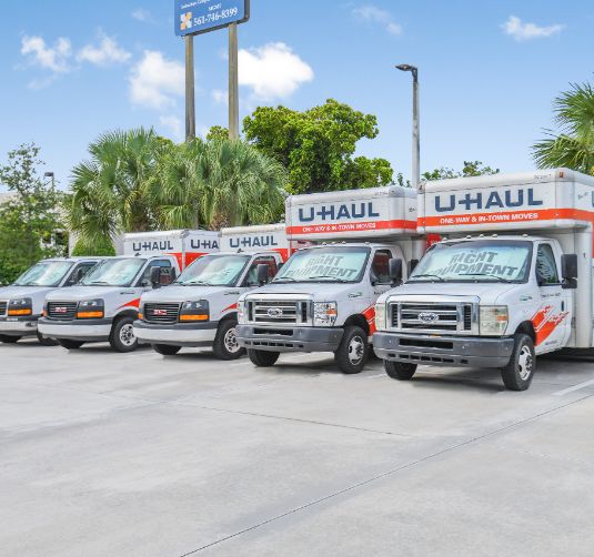 U-Haul rental trucks parked at Value Store It facility location.