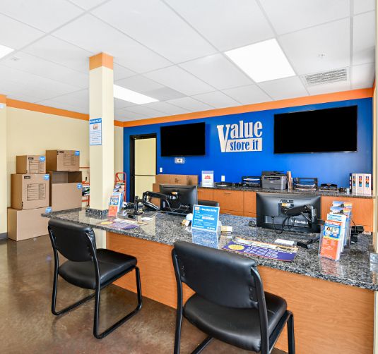 Value Store It office interior with reception counter and customer seating area.